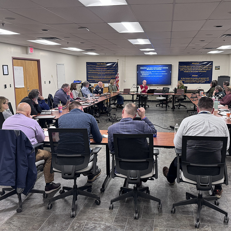 ACLT members in thee school board room